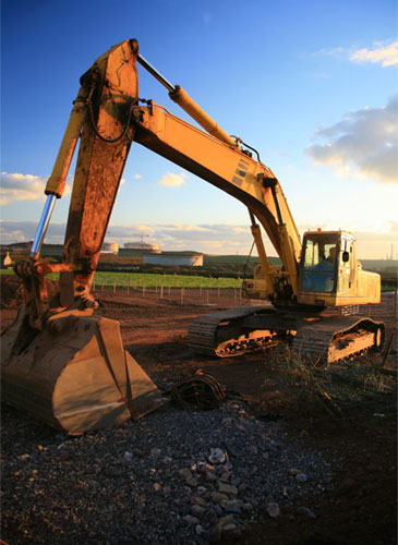 Excavator at industrial construction site in Northwest Georgia
